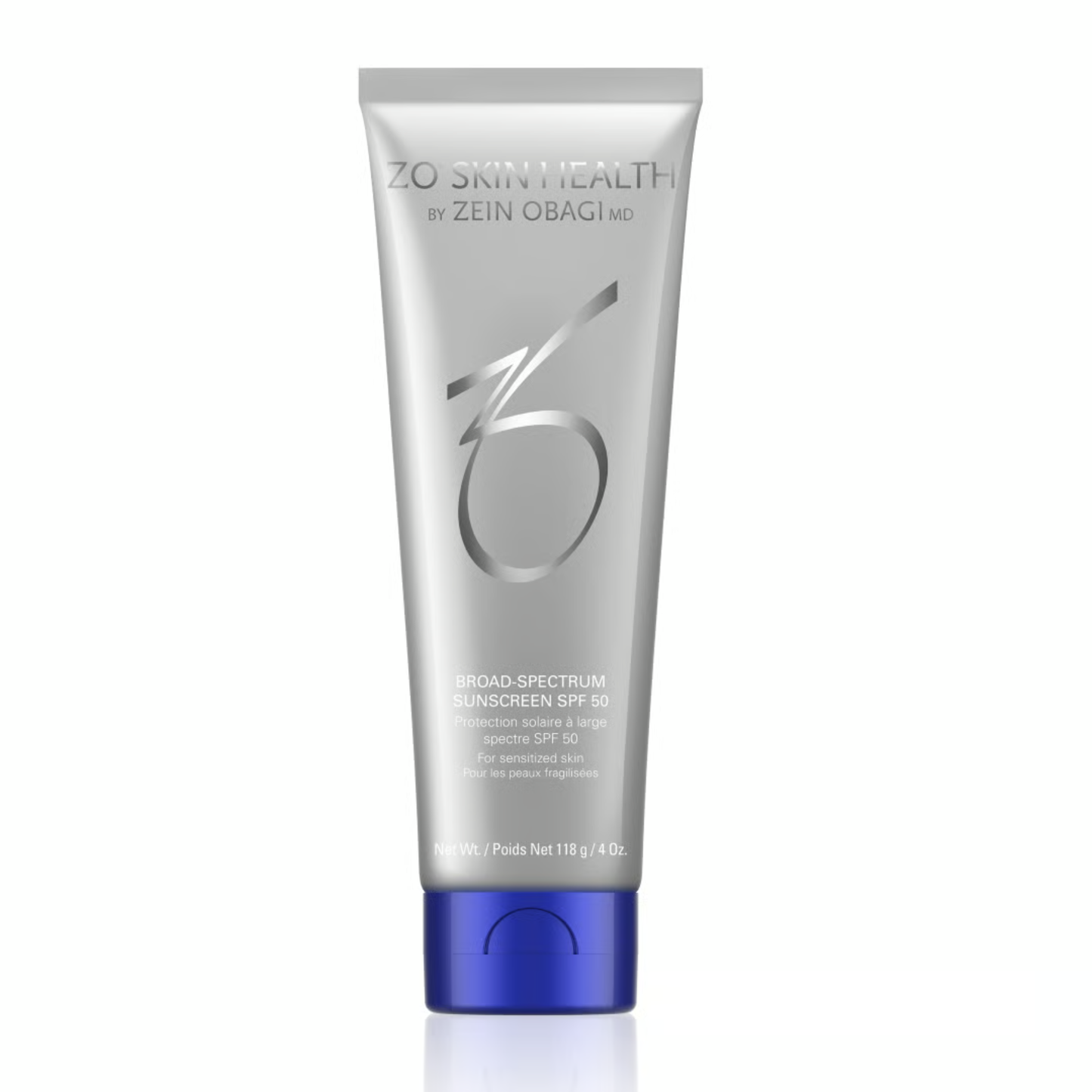 A silver squeeze tube of ZO Skin Health by Zein Obagi Broad Spectrum Sunscreen SPF 50 with a metallic blue cap, shown on a white background with a soft reflection.